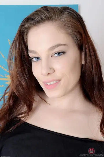 Petite Redhead Shows Her Hairy Pussy and Tattoo