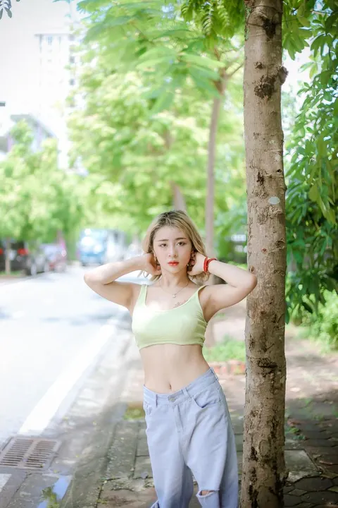 Petite Asian Babe Poses in Jeans Outdoors – photo 19 of 21