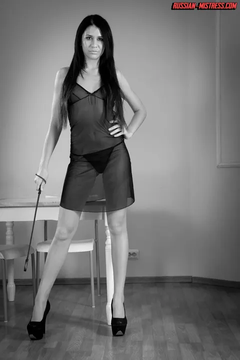 Brunette in High Heels Dominates Male Slave with Piss in the Bathroom – photo 1 of 16