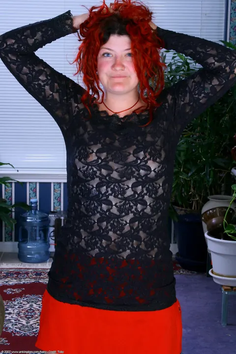Woman Strips Nude and Turns to Show Her Hairy Bush – photo 1 of 21