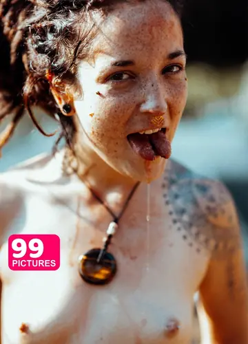 Tattooed Brunette in Pigtails Gives a Blowjob and Handjob