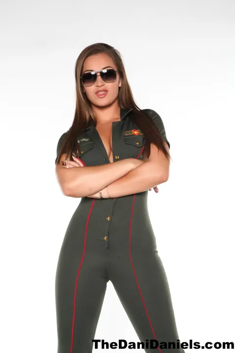 Dani Daniels: Busty Brunette Strips Out of Her Flight Uniform in Heels – photo 6 of 15