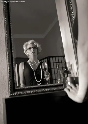 Busty Blonde MILF in Glasses and Stockings Strips Out of Her Dress