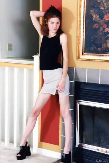 Slim Brunette Fingers Her Shaved Pussy