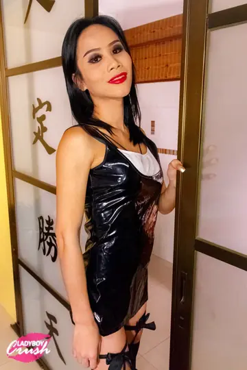 Tall Trans Woman Strips Off Her Latex Dress in Stockings