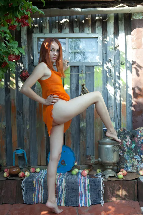 Redhead Pulls Her Panties Aside and Spreads Outdoors – photo 12 of 21