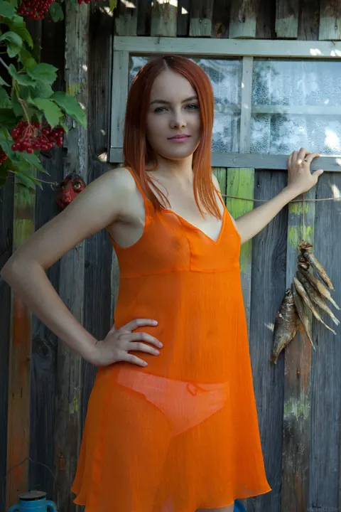 Redhead Pulls Her Panties Aside and Spreads Outdoors – photo 4 of 21