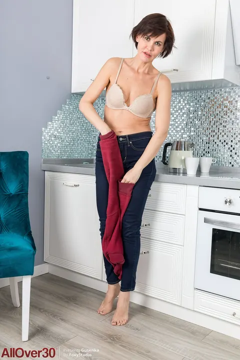 Busty Brunette MILF Strips Off Her Jeans and Masturbates in the Kitchen – photo 6 of 21