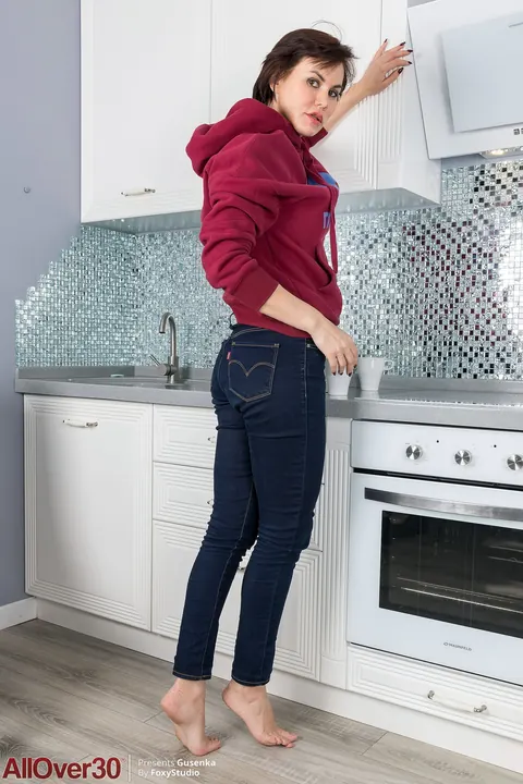 Busty Brunette MILF Strips Off Her Jeans and Masturbates in the Kitchen – photo 4 of 21