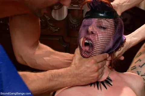 Odile: Busty Redhead in Fishnet Takes Double Penetration in Bondage – photo 12 of 20