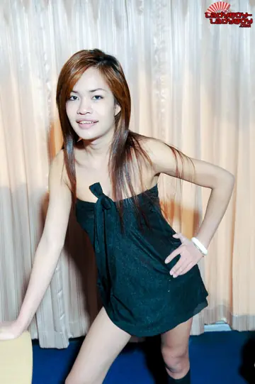 Asian Trans Woman Undresses Fully and Poses Nude Showing Her Hard Cock