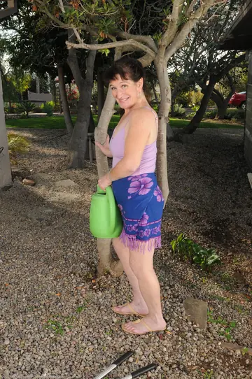 Busty MILF Rubs Her Shaved Pussy Outdoors