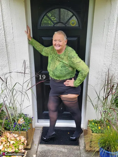 Valgasmic Exposed: Short-Haired Redhead BBW Poses in Stockings and Panties – photo 16 of 16