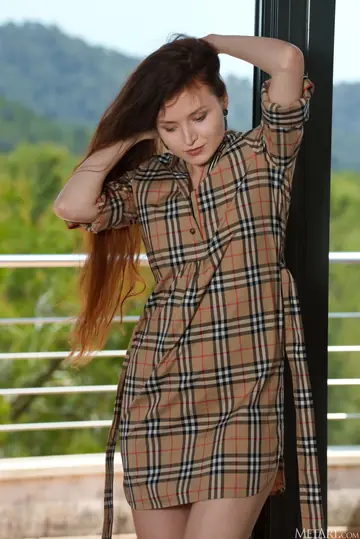 Redhead in High Heels Spreads Her Shaved Pussy