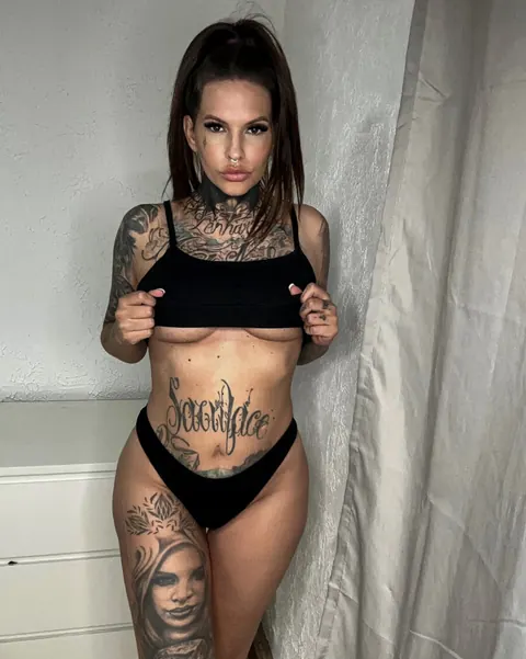 Tattooed Woman Poses in Lingerie Showing Her Ink – photo 11 of 15