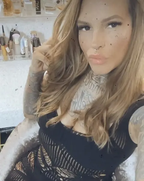 Tattooed Woman Poses in Lingerie Showing Her Ink – photo 15 of 15
