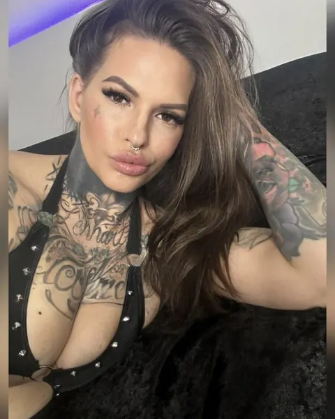 Tattooed Woman Poses in Lingerie Showing Her Ink – photo 12 of 15