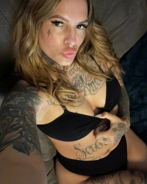 Tattooed Woman Poses in Lingerie Showing Her Ink – photo 2 of 15