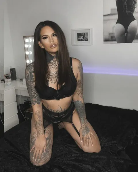 Tattooed Woman Poses in Lingerie Showing Her Ink – photo 10 of 15