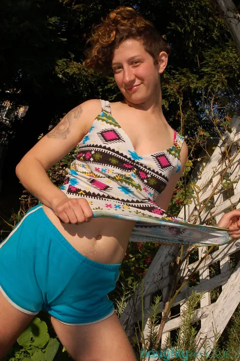 Amateur with Short Hair Spreads Her Hairy Pussy Outdoors – photo 4 of 21