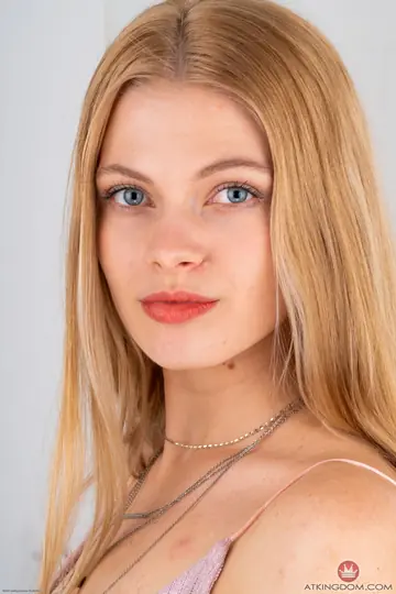 Blonde Strips Nude and Poses Showing Her Small Natural Tits