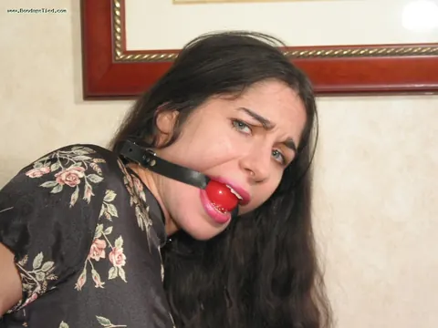 Brunette in Stockings Restrained and Gagged While Spreading Her Pussy – photo 12 of 16