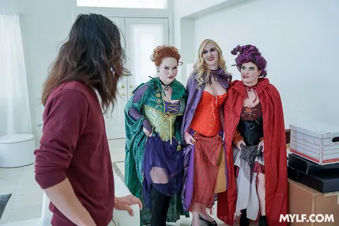 Audrey Madison: Blonde and Redhead MILFs in Costumes Dominate a Man in a Group – photo 7 of 21