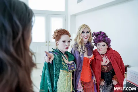 Audrey Madison: Blonde and Redhead MILFs in Costumes Dominate a Man in a Group – photo 8 of 21
