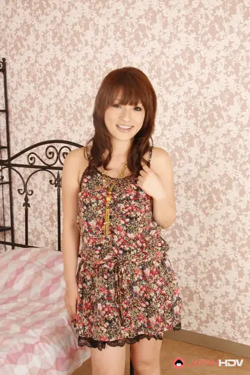 Japanese Redhead MILF Strips Out of Her Skirt and Boots on the Bed
