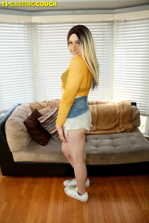 Trans Woman Undresses and Poses Nude on a Sofa – photo 1 of 16