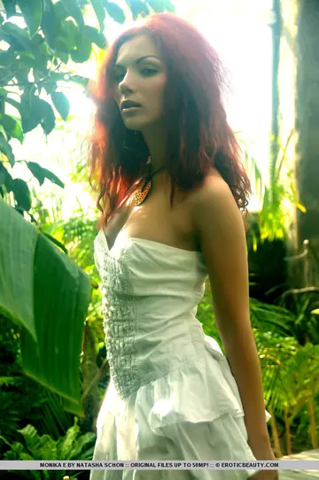 Thick Redhead Frees Her Big Tits in the Garden