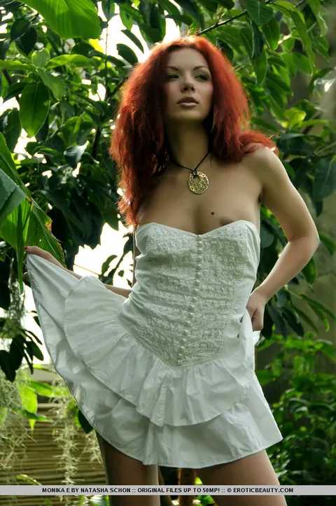 Monika E: Thick Redhead Frees Her Big Tits in the Garden – photo 2 of 16