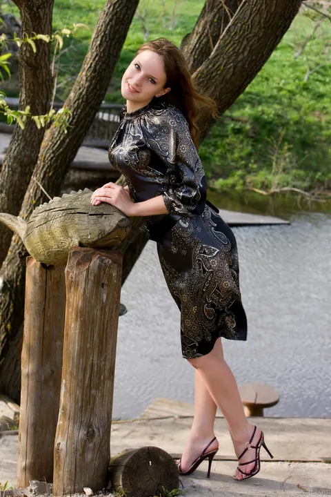 Ilze: European Brunette in a Skirt and High Heels Spreads Outdoors – photo 1 of 21
