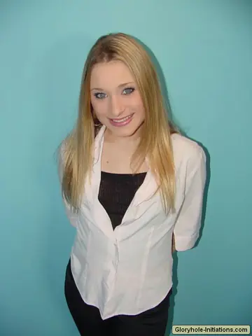Blonde MILF Gives a Gloryhole Blowjob and Takes a Facial in the Bathroom