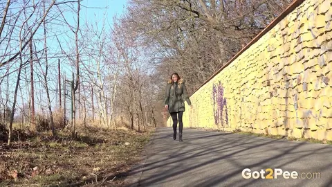 Cynthia Vellons: Slim Blonde MILF in Boots Pisses on Paved Road – photo 1 of 15
