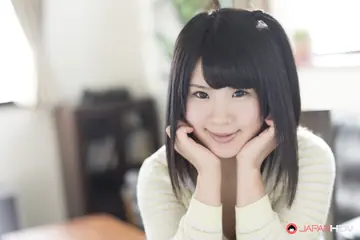 Japanese Woman Pulls Down Her Panties on the Sofa