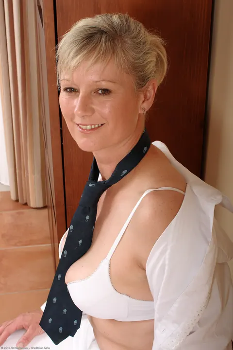 Blonde MILF Pulls Panties Aside to Show Her Hairy Pussy – photo 3 of 21