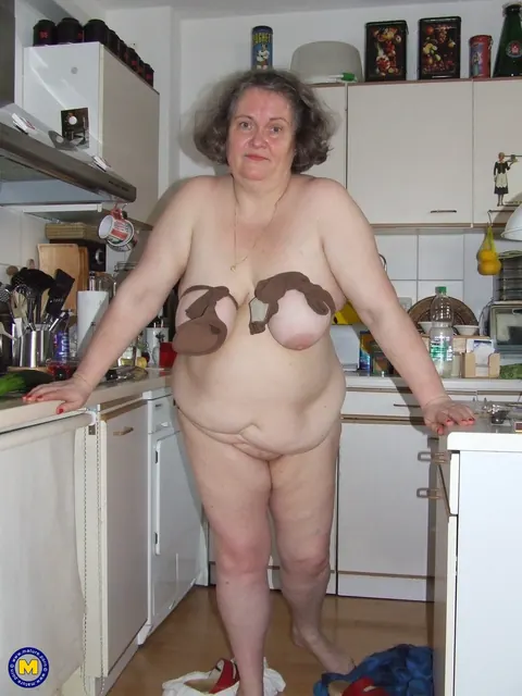 Birgid: Busty Curvy Mature Woman Masturbates with a Cucumber on the Kitchen Counter – photo 20 of 20