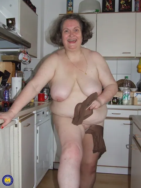 Birgid: Busty Curvy Mature Woman Masturbates with a Cucumber on the Kitchen Counter – photo 17 of 20