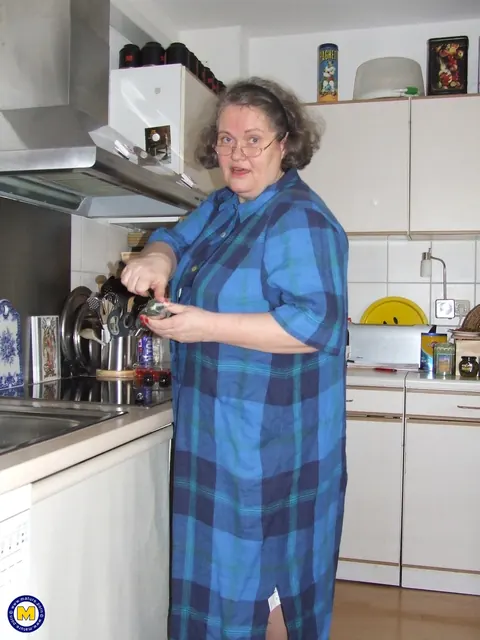 Birgid: Busty Curvy Mature Woman Masturbates with a Cucumber on the Kitchen Counter – photo 2 of 20