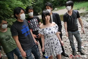 Japanese Redhead Gives Blowjobs to a Group Outdoors