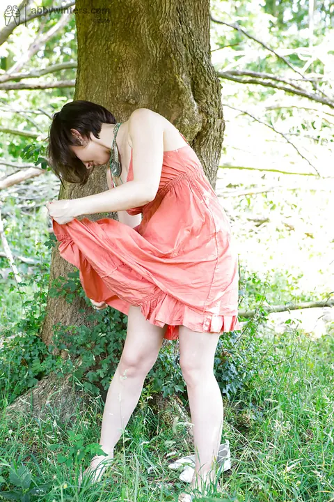 Remie: Thick Brunette MILF Shows Her Hairy Pussy Outdoors in a Skirt – photo 13 of 16