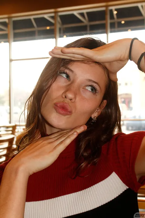 Gaby Mueller: Amateur Brunette Flashes Sheer Undies and Spreads Her Legs at a Restaurant – photo 2 of 12