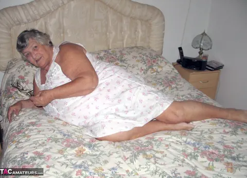 European BBW Strips on the Bed and Grabs Her Belly Roll – photo 2 of 20