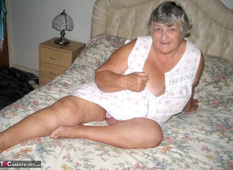 European BBW Strips on the Bed and Grabs Her Belly Roll – photo 4 of 20