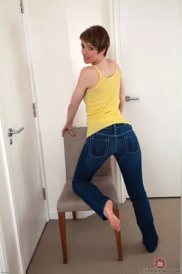 Skinny Woman Strips Out of Her Jeans and Spreads Her Hairy Pussy