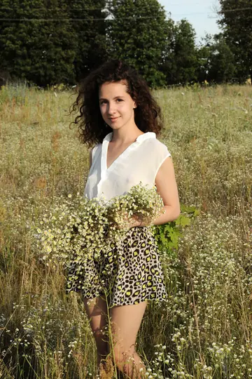Ukrainian Brunette Strips and Poses Nude Showing Her Small Natural Tits