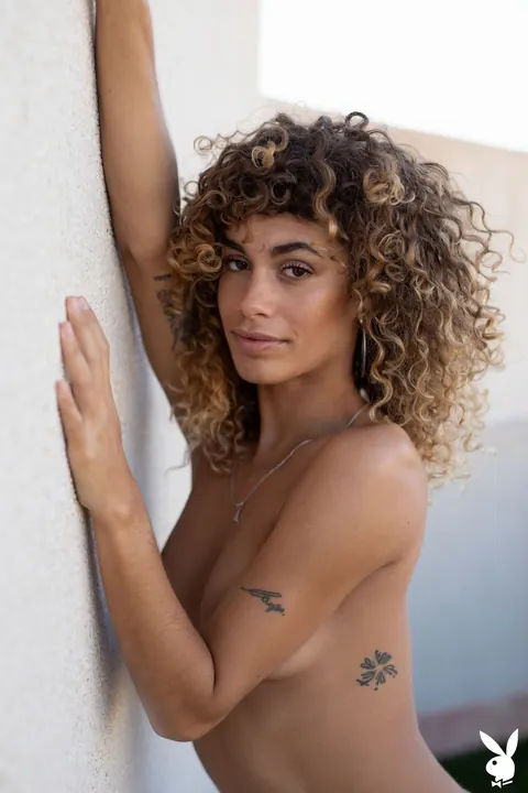Curly-Haired Woman Strips and Spreads on the Balcony – photo 15 of 21