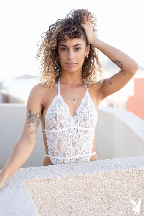 Curly-Haired Woman Strips and Spreads on the Balcony – photo 3 of 21