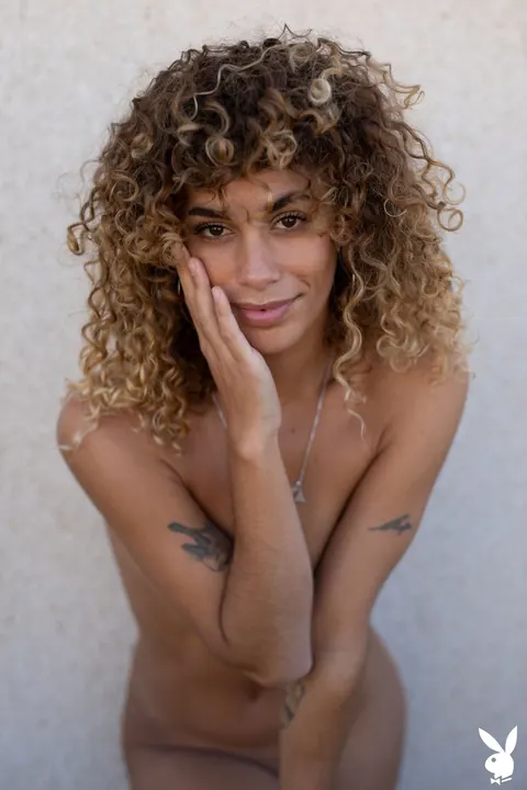 Curly-Haired Woman Strips and Spreads on the Balcony – photo 14 of 21